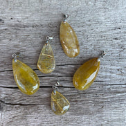 PENDENTIFS EN QUARTZ RUTILE