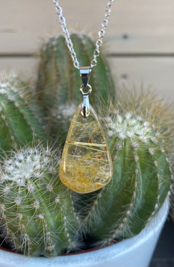 PENDENTIFS EN QUARTZ RUTILE